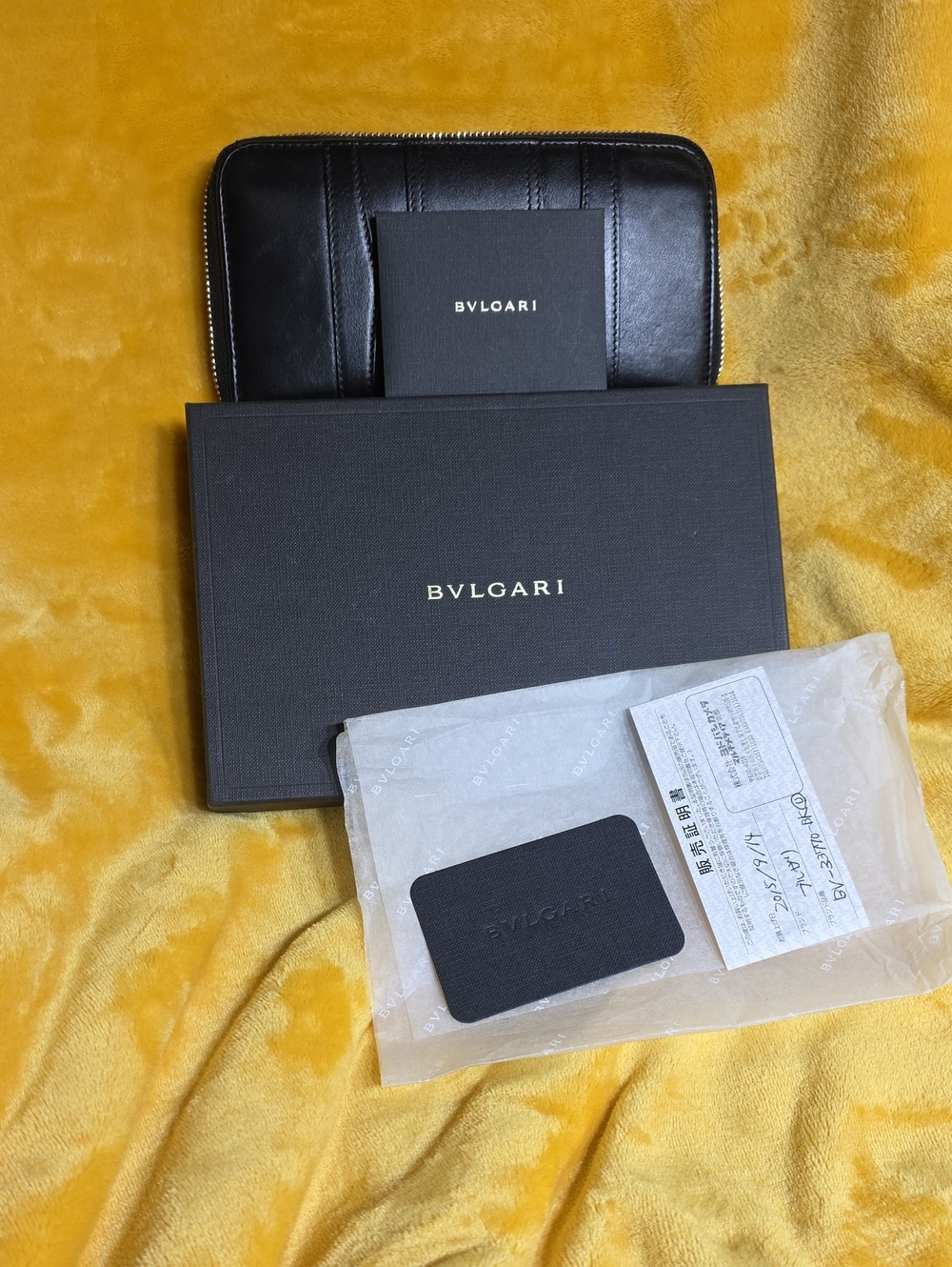 Authentic Bulgari Black Leather Zip-Around Wallet with Gold Hardware